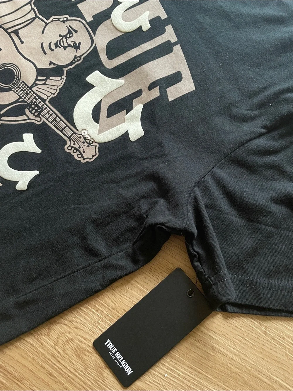True Religion Black Tee with Beige Graphic Buddha Guitar Logo